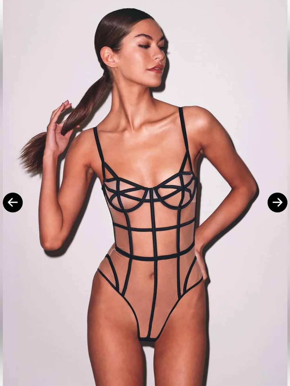 FAUX LEATHER CAGED BODYSUIT
fleur du mal Bodysuit in Black